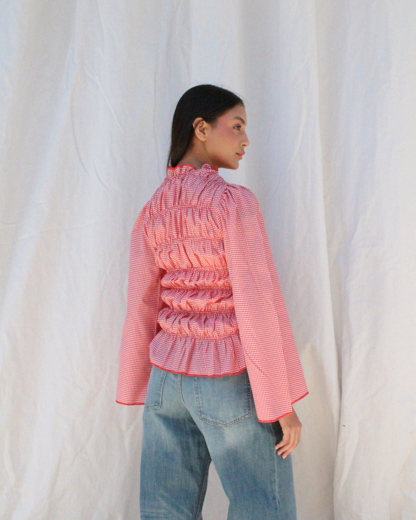 Smocked long sleeve top in red