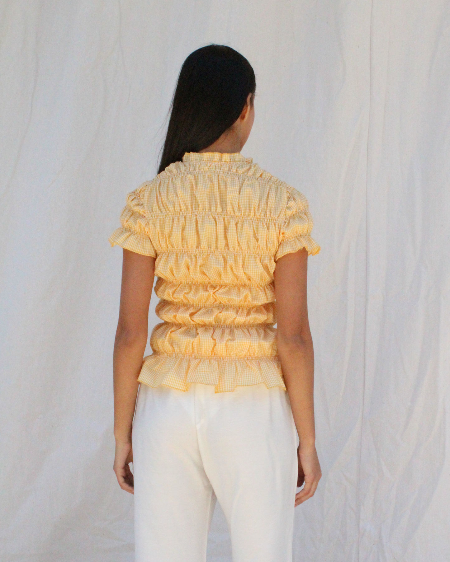 Smocked top in yellow