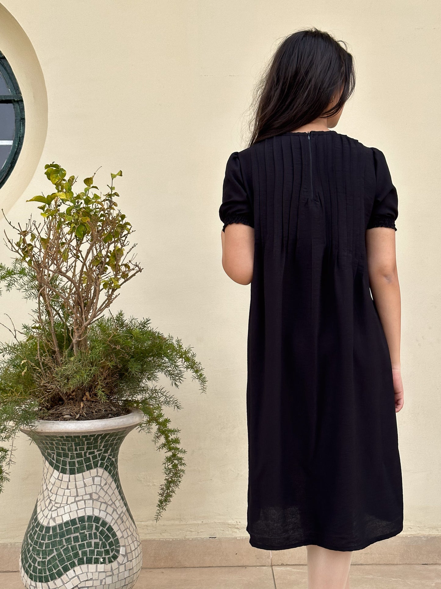 Black with a twist dress