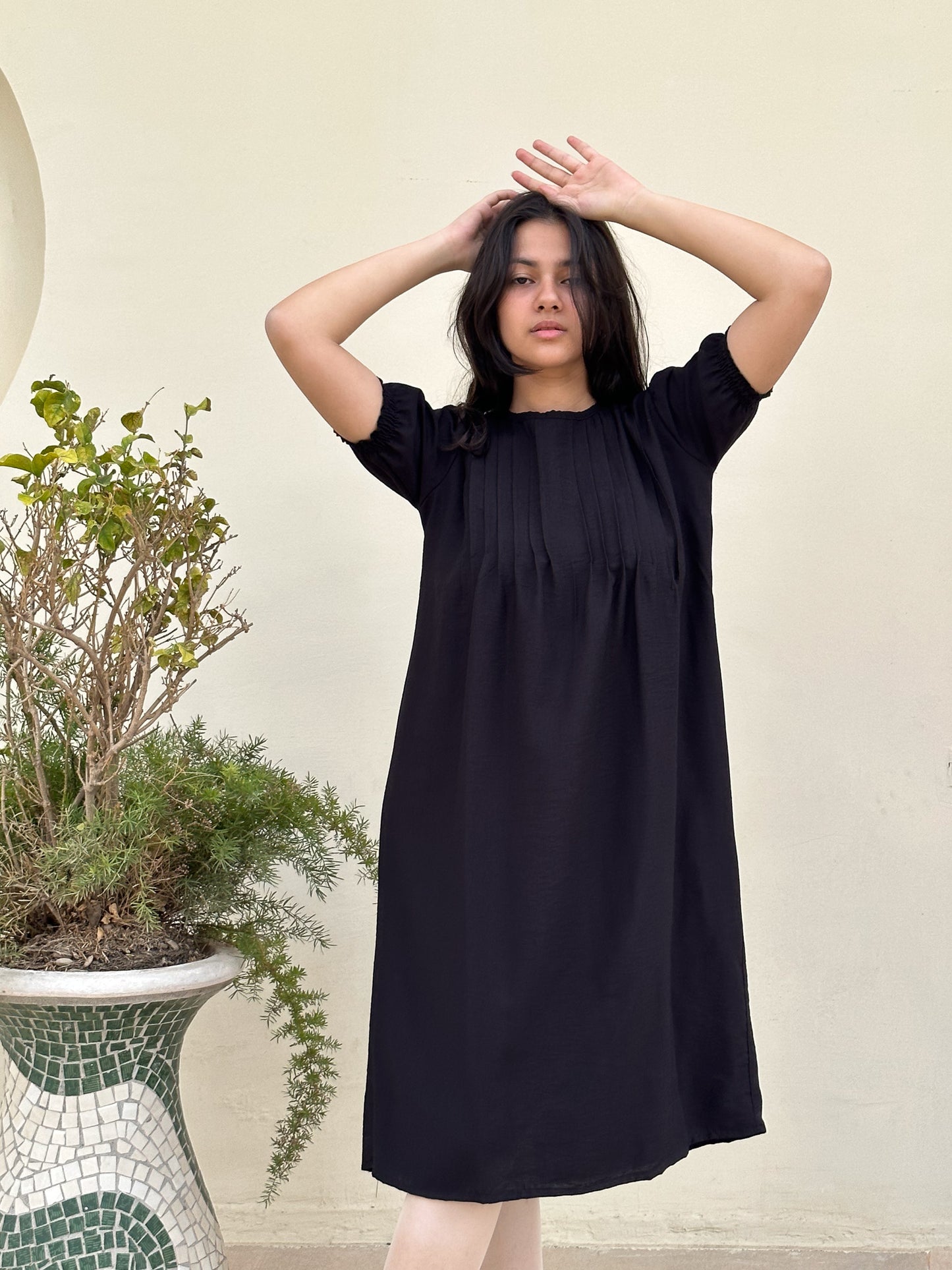 Black with a twist dress