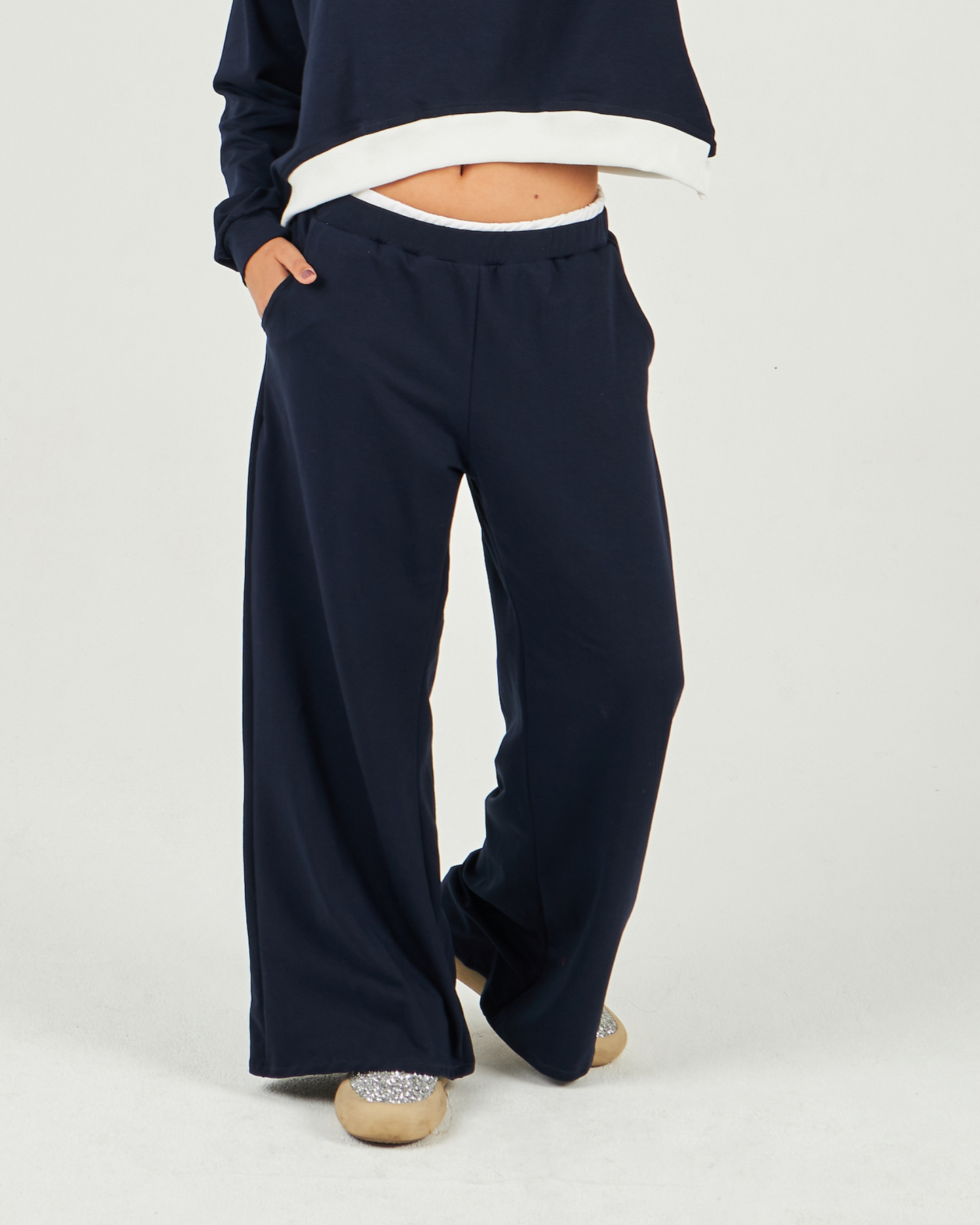 The navy sweatpants