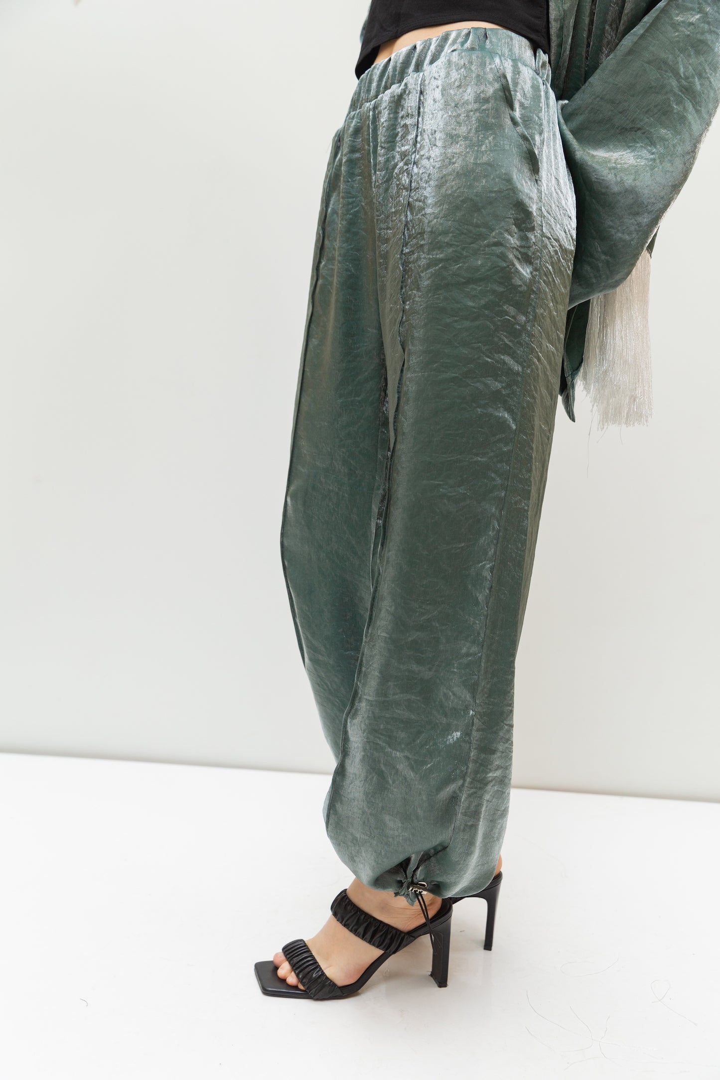 Shimmery pants in olive