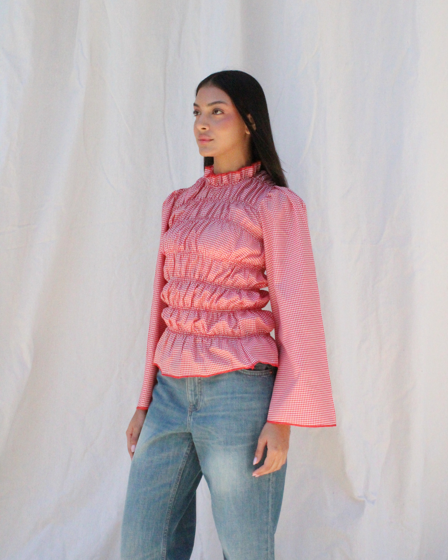 Smocked long sleeve top in red