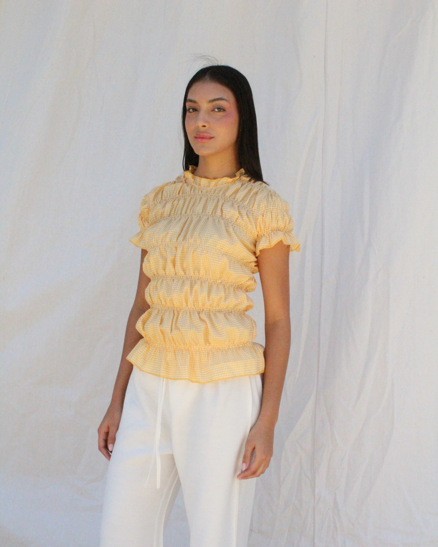 Smocked top in yellow