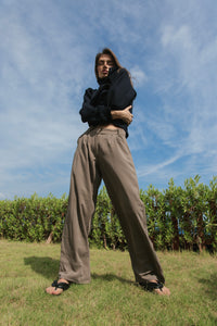 Loose pants in dark beige