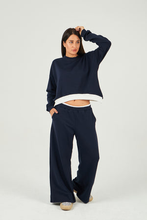 The navy sweatpants