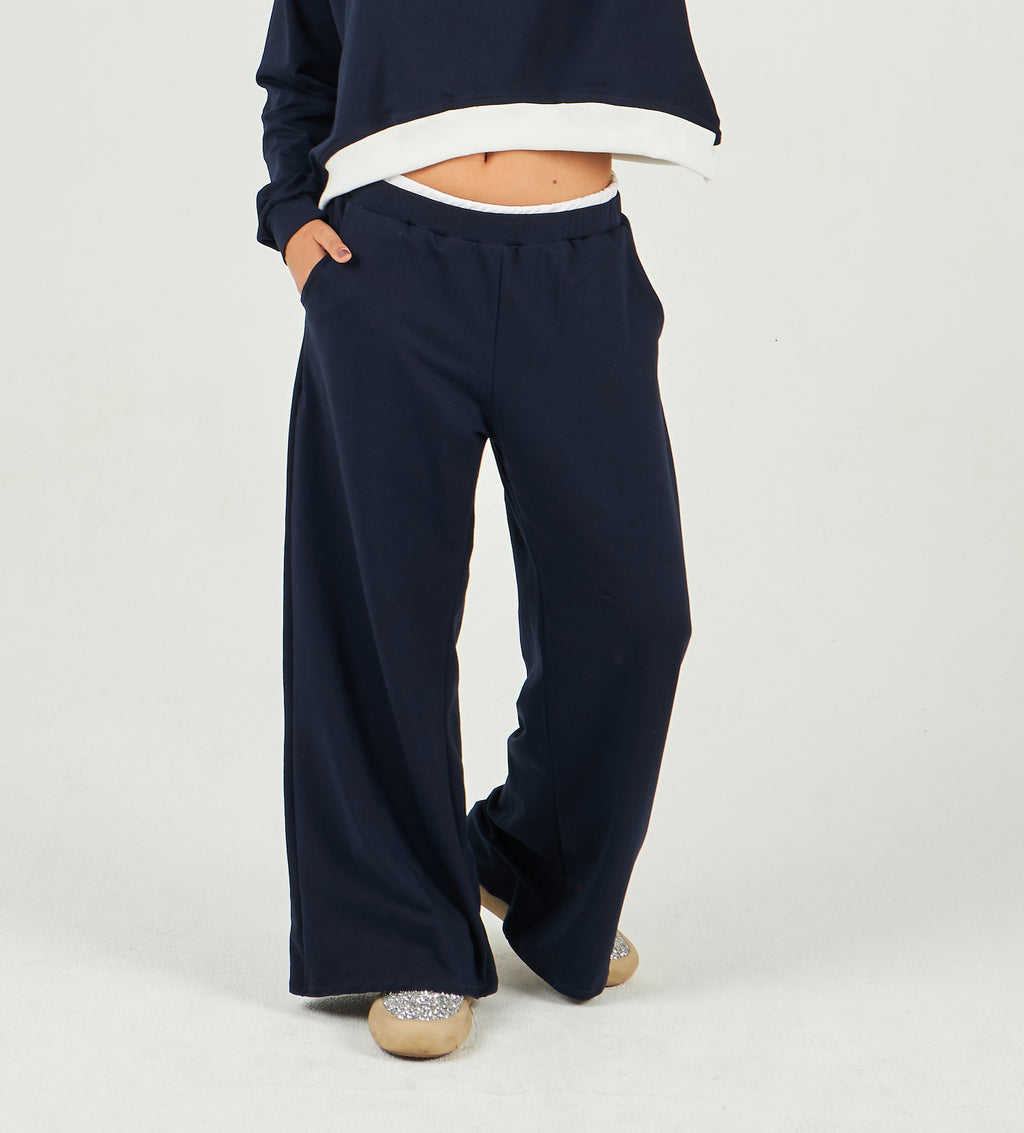 The navy sweatpants