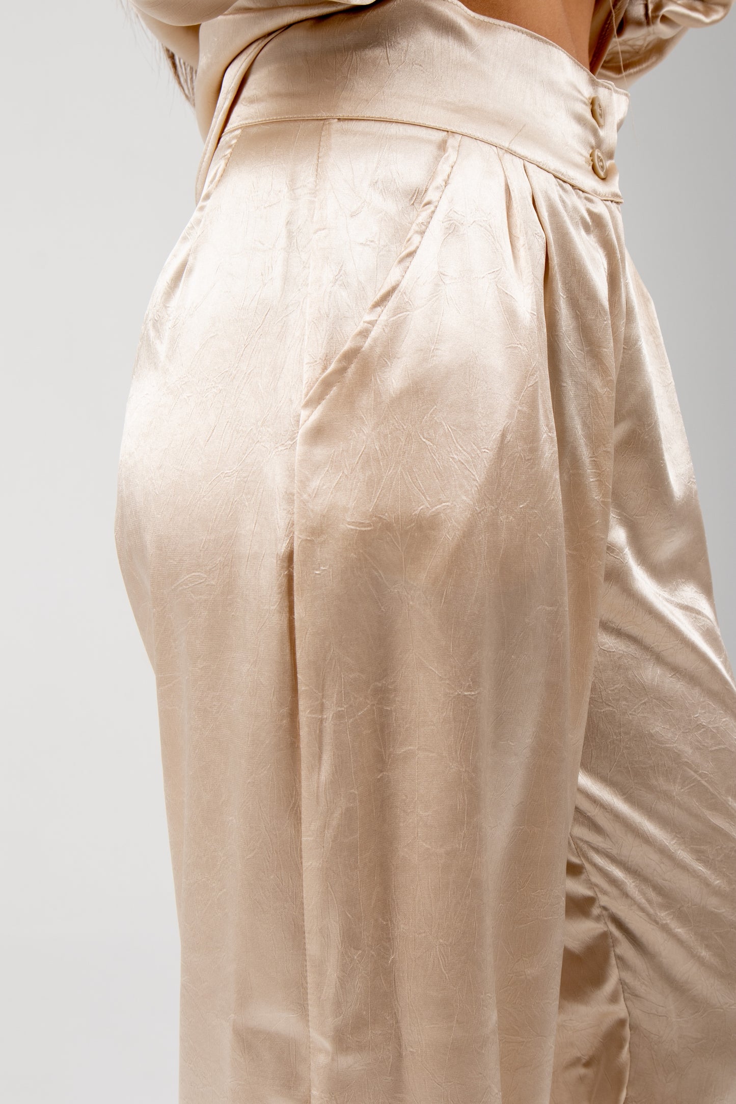 Crushed satin pants in beige