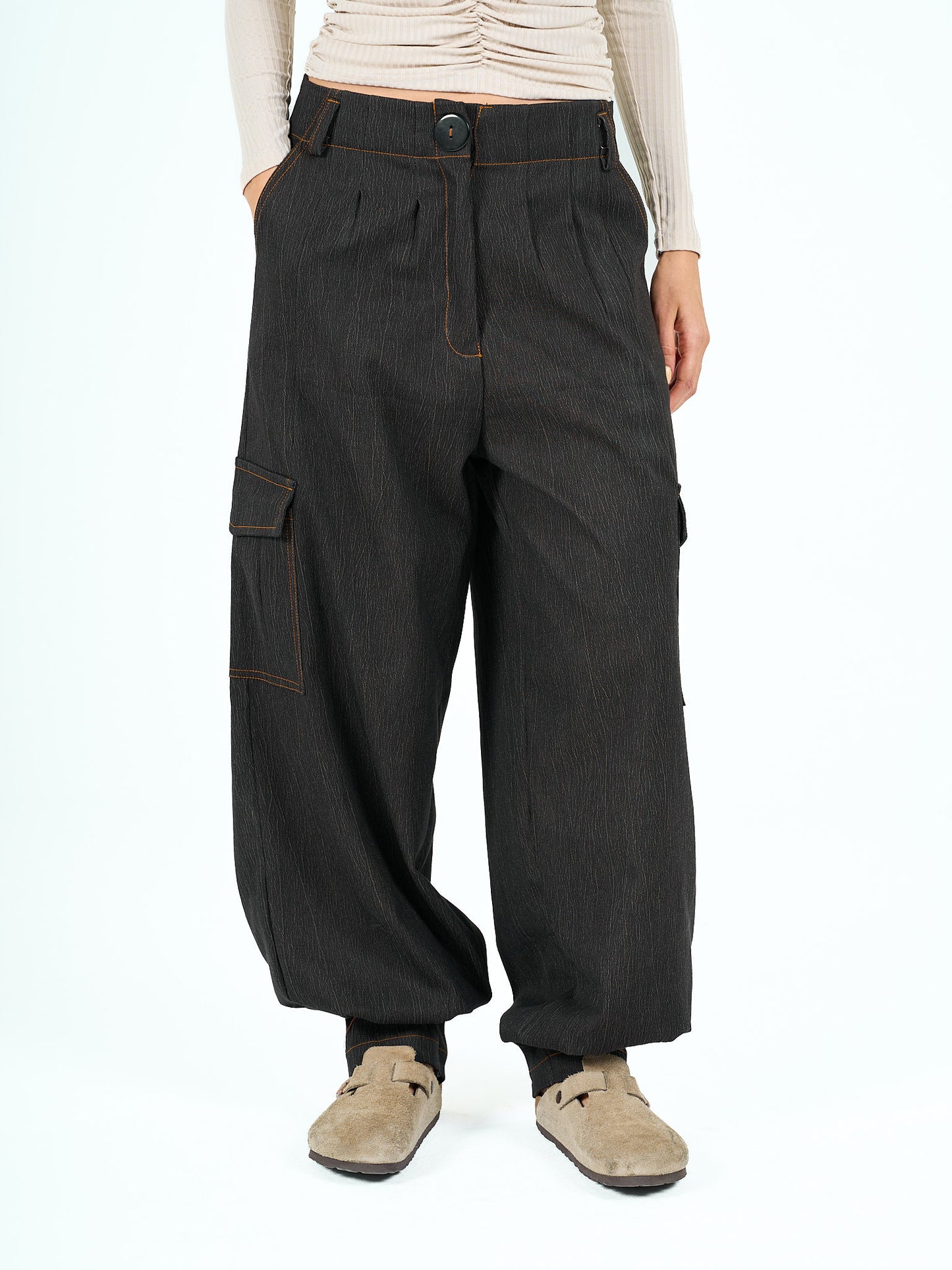 Parachute pants in black tie dye denim