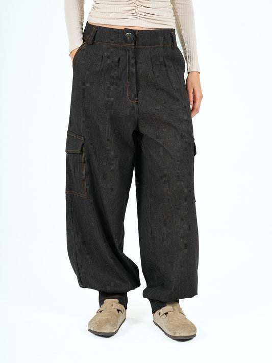 Parachute pants in black tie dye denim