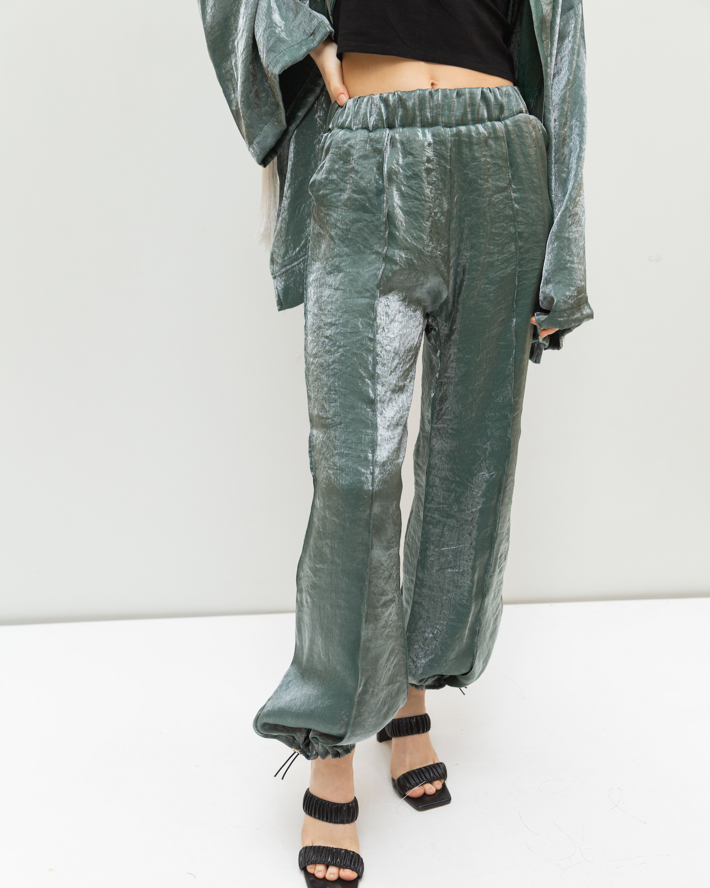 Shimmery pants in olive