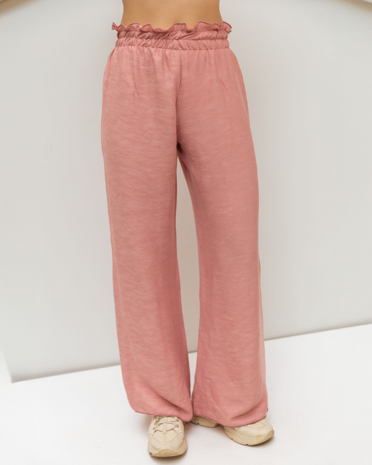 Pleated pants in pink