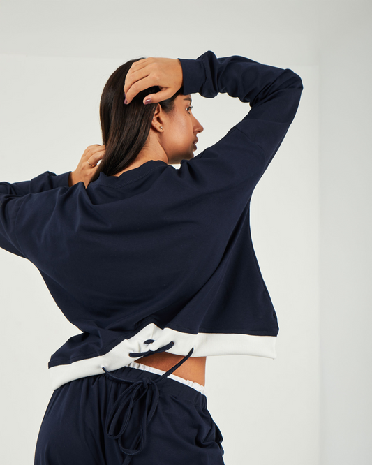The navy sweatshirt
