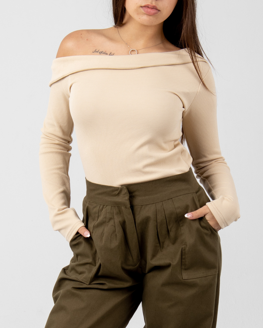 Off shoulder top in beige.