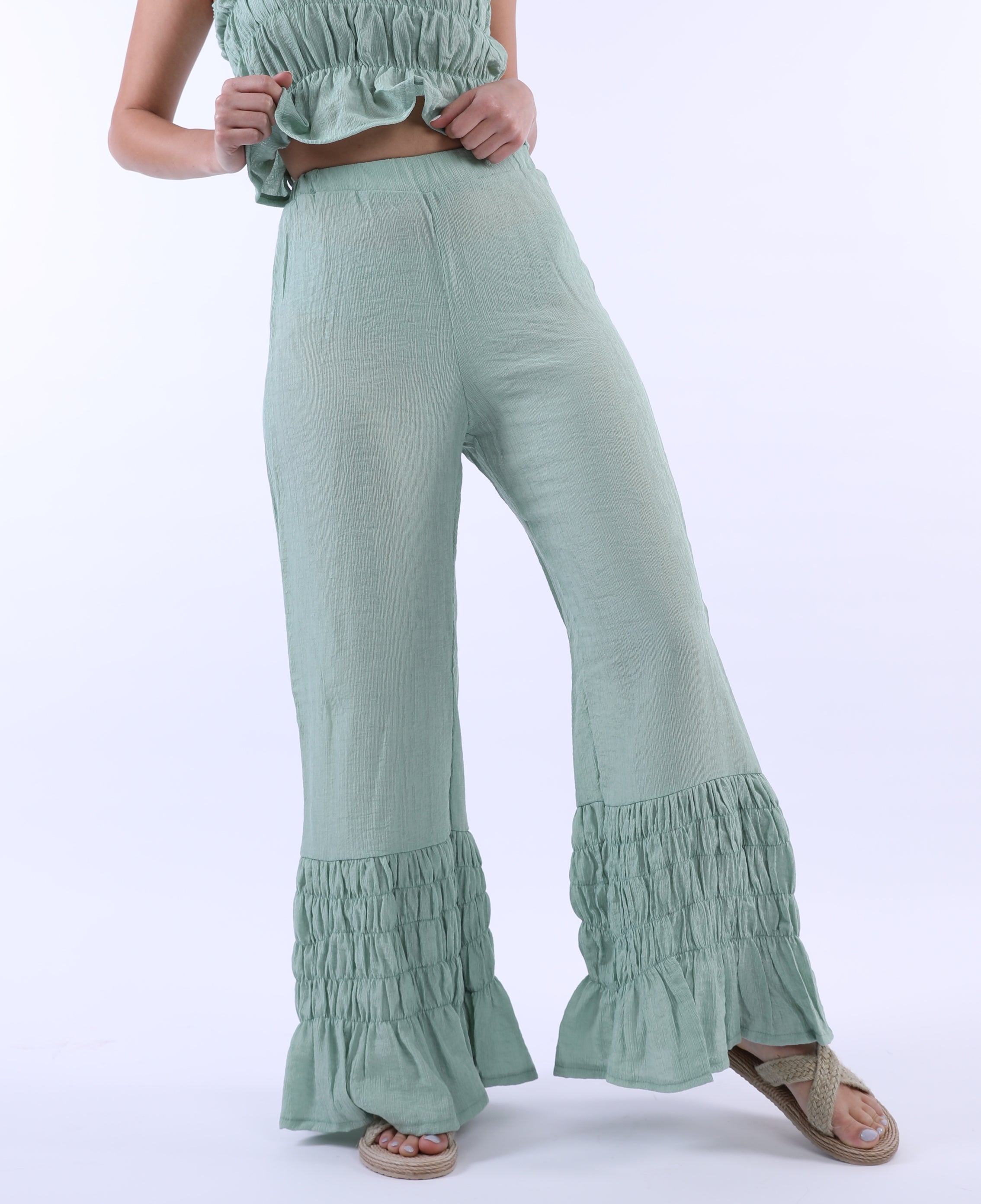 Curly pants in turquoise
