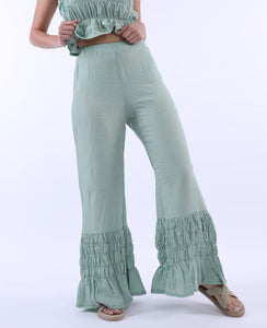 Curly pants in turquoise