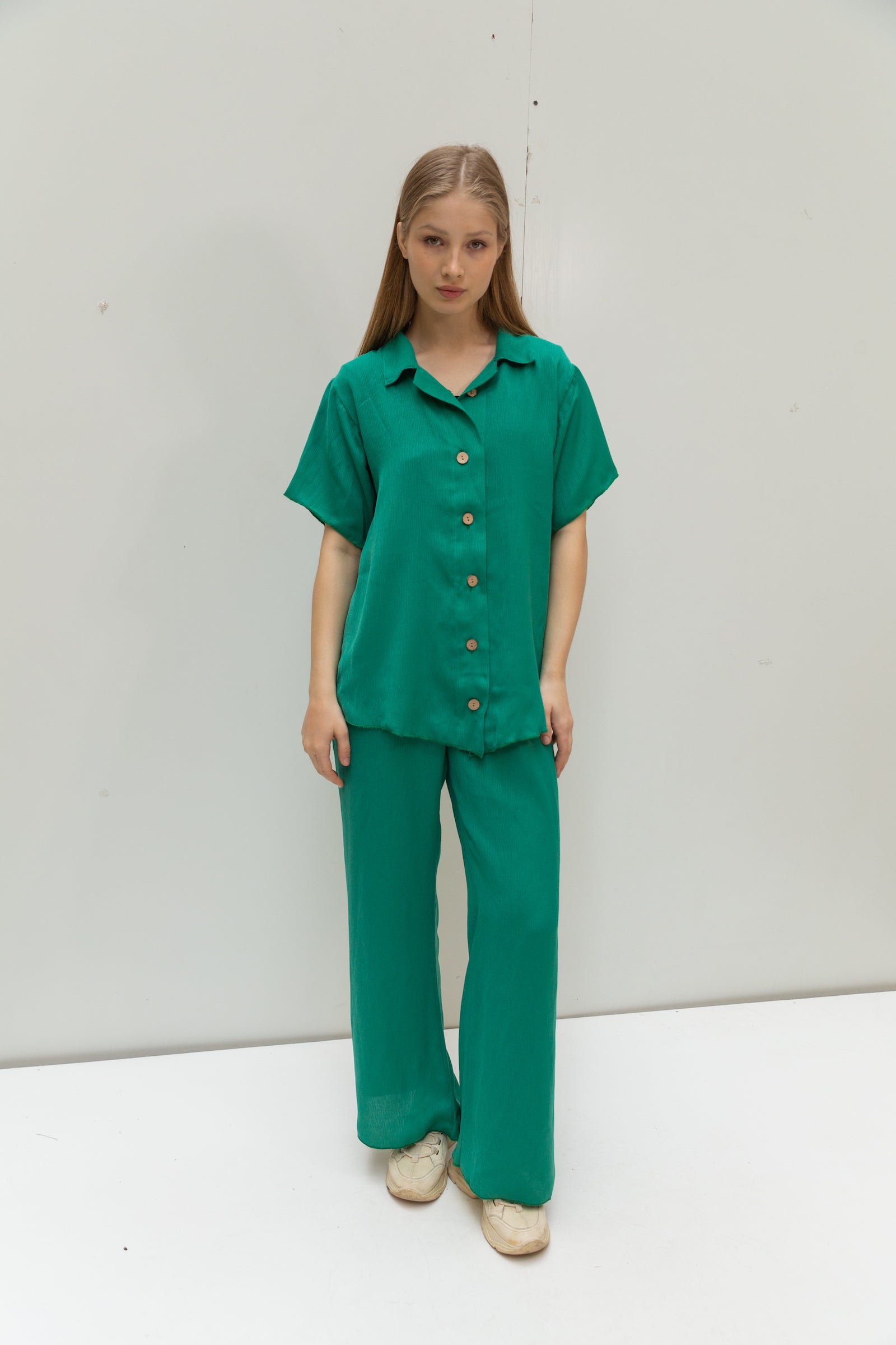 Pleated shirt in turquoise