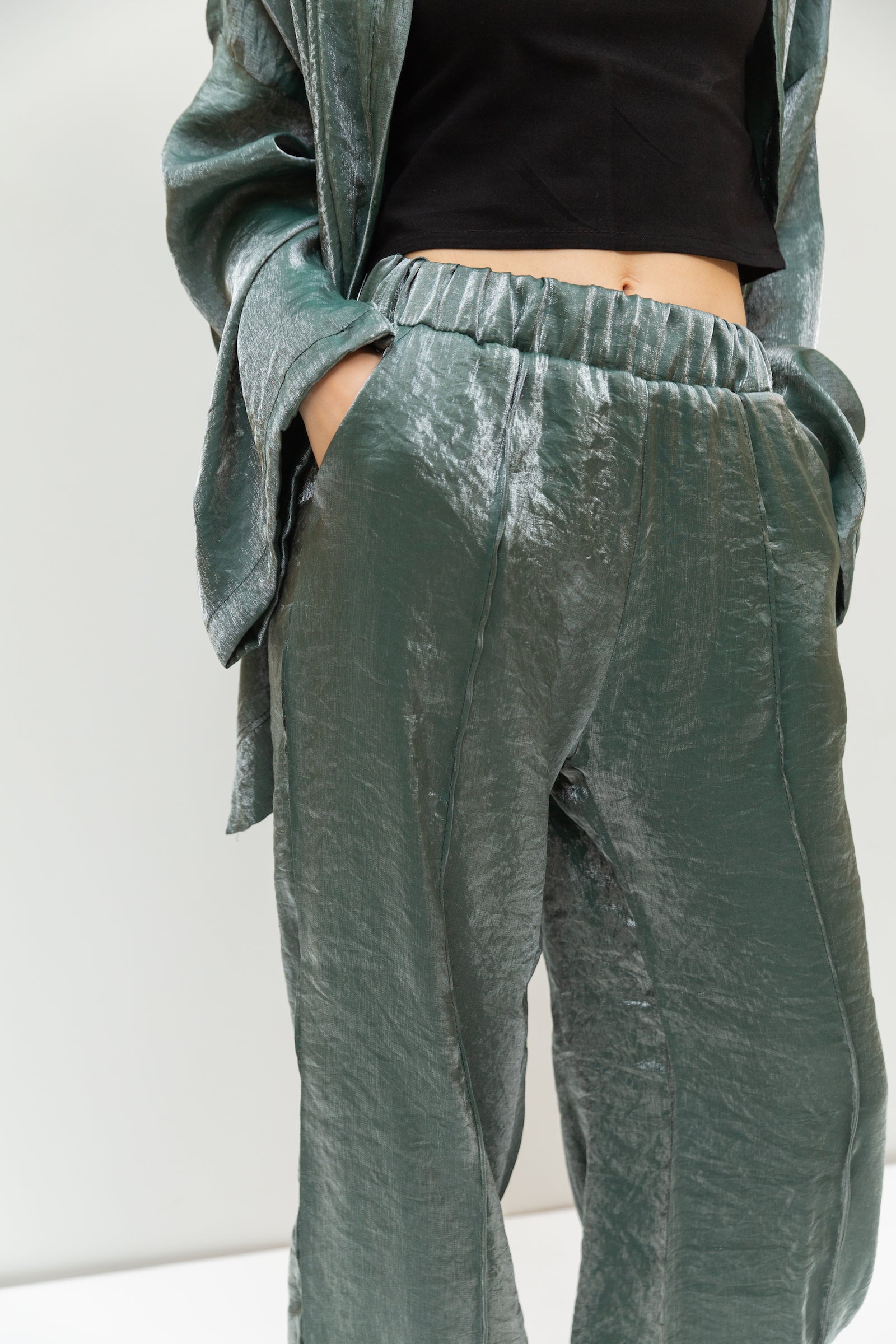 Shimmery pants in olive
